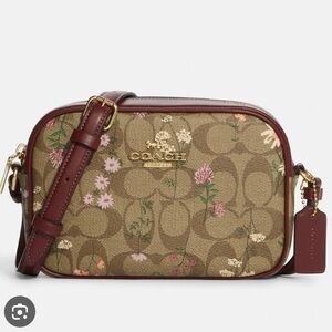 Coach Jamie Camera Bag In Signature
Canvas W. Wildflower Print
